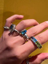 Oval Period × Blue Topaz Heart Eternity Ring