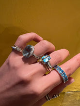 Oval Period × Blue Topaz Heart Eternity Ring